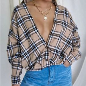 Plaid drop shoulder button up blouse